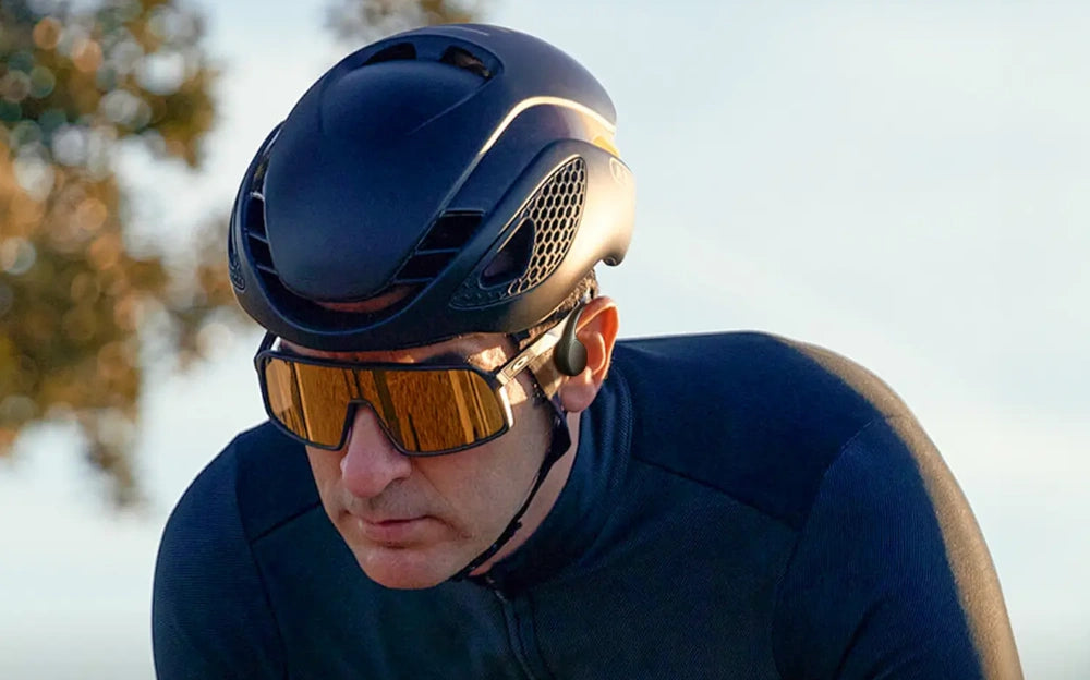 using Tousains bone conduction headphones for outdoor cycling